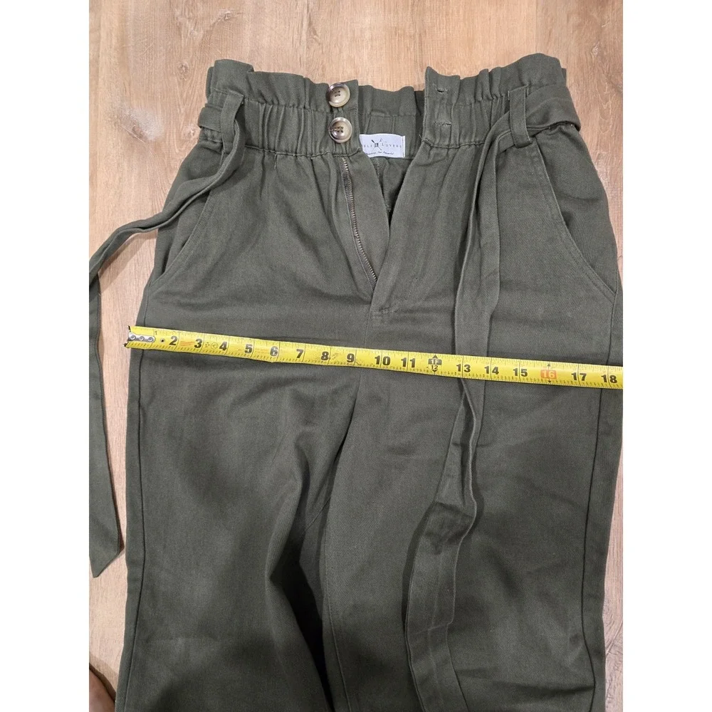 Rebels & Lovers casual pants featuring a flattering paperbag high-rise waist....
